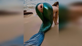 A Stranger Vigorously Penetrates A Mermaid'S Tight Asshole On The Beach, Causing It To Gape Widely Outdoors